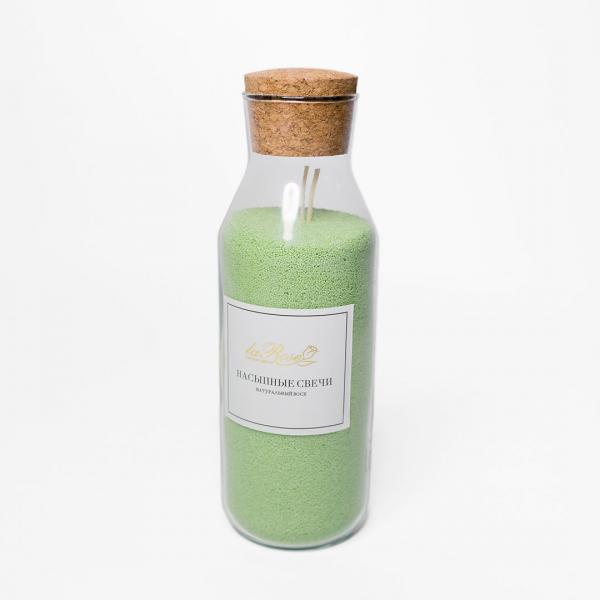 Light green granule сandle in bottle